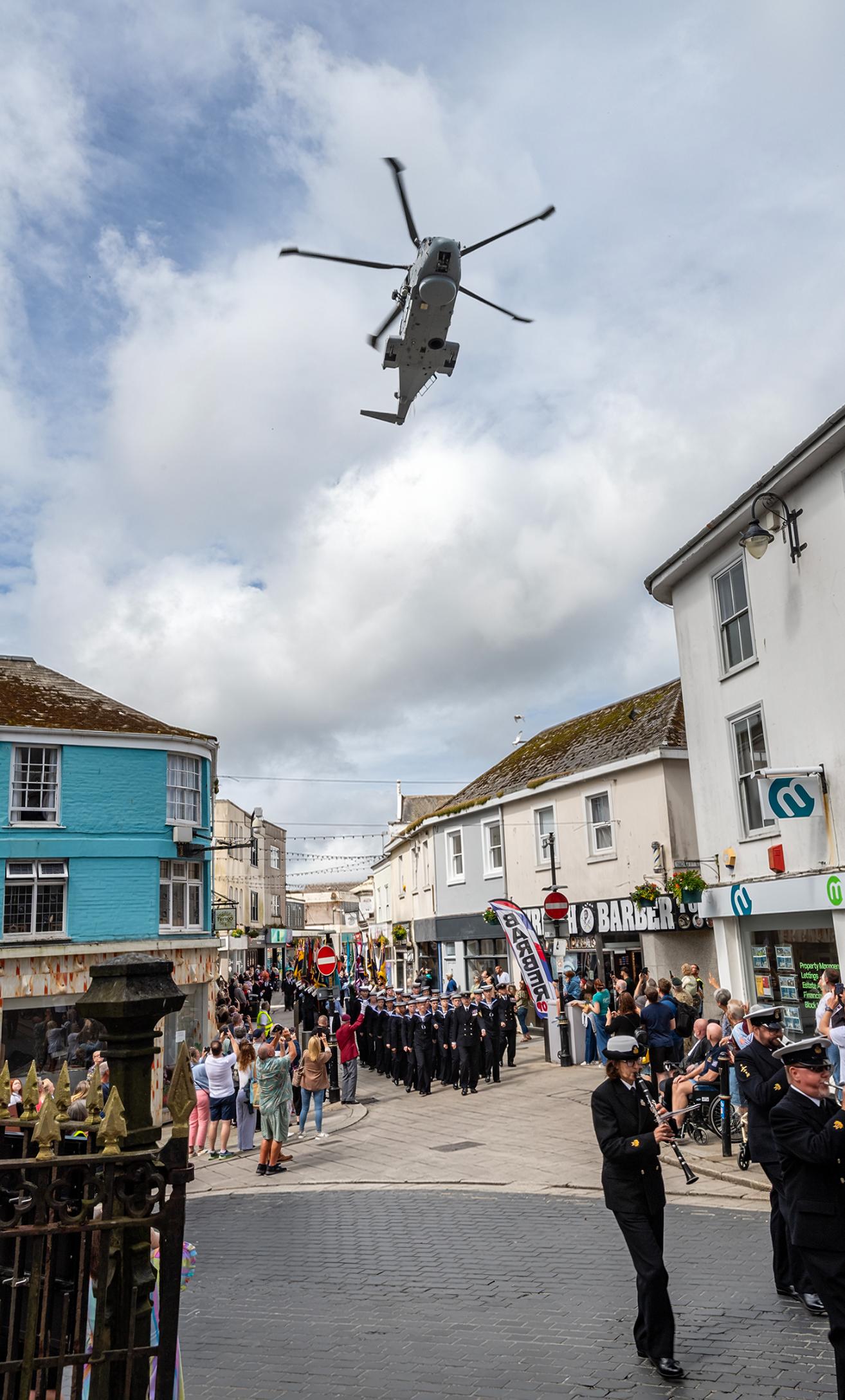 A Merlin Helicopter flies over