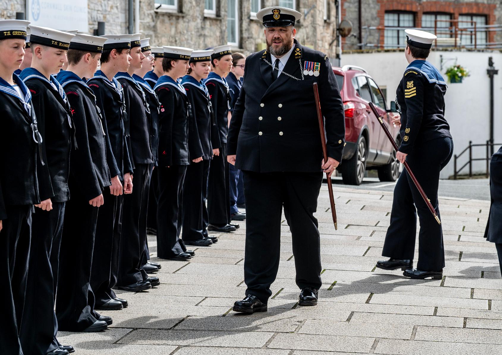 Members of the royal navy line up in Biddicks court