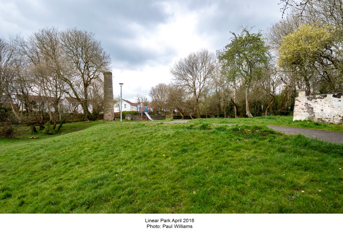 The south side of Linear Park, containing the ruins of a bulding, April 2018
