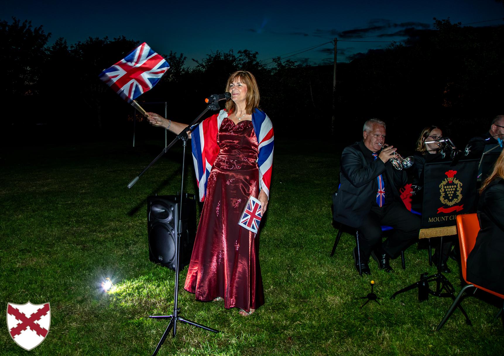 Alison Harvey sings with Mount Charles Band