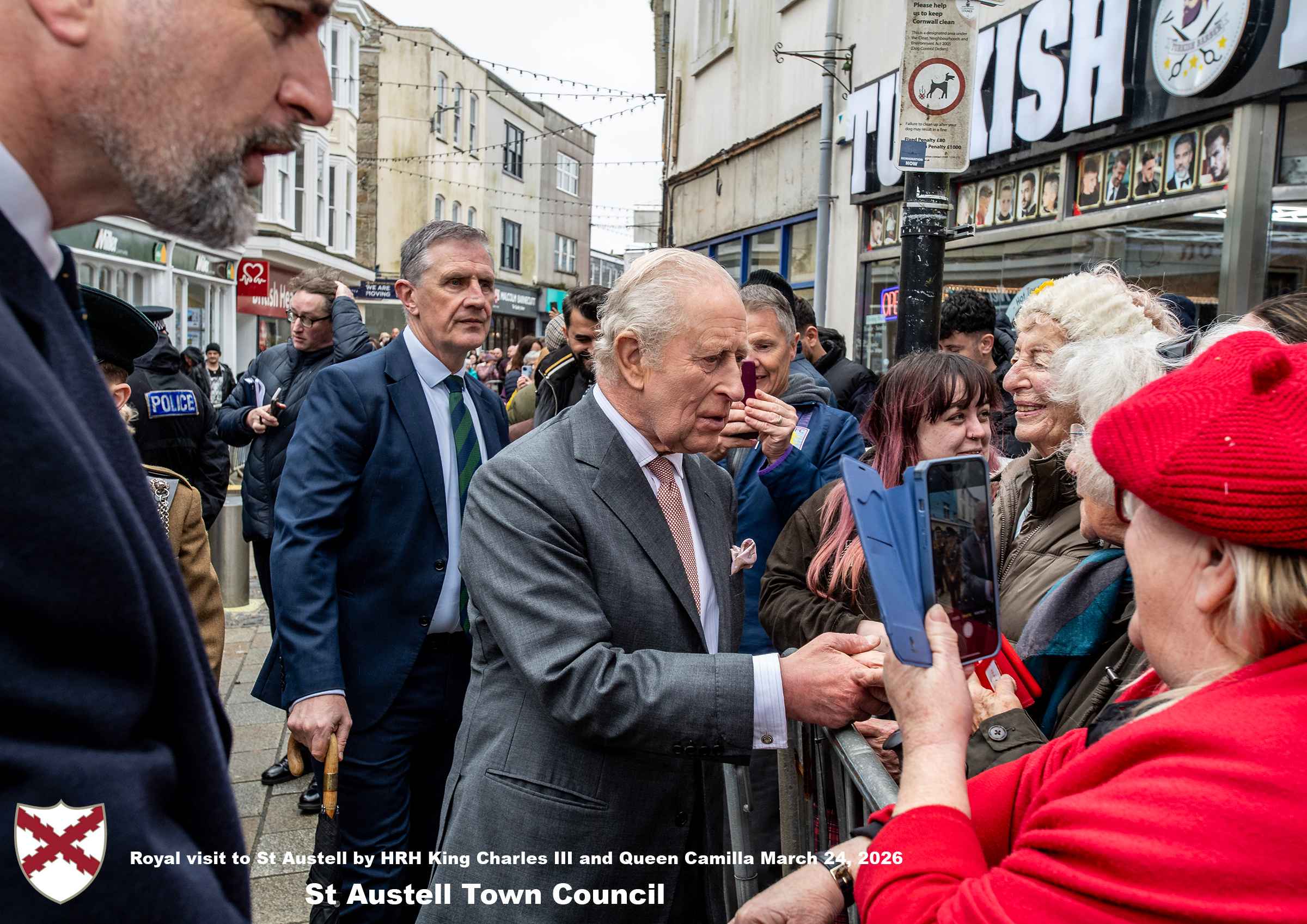 His Majesty King Charles and Her Majesty Queen Camilla meet members of the public in St Austell Town Centre.