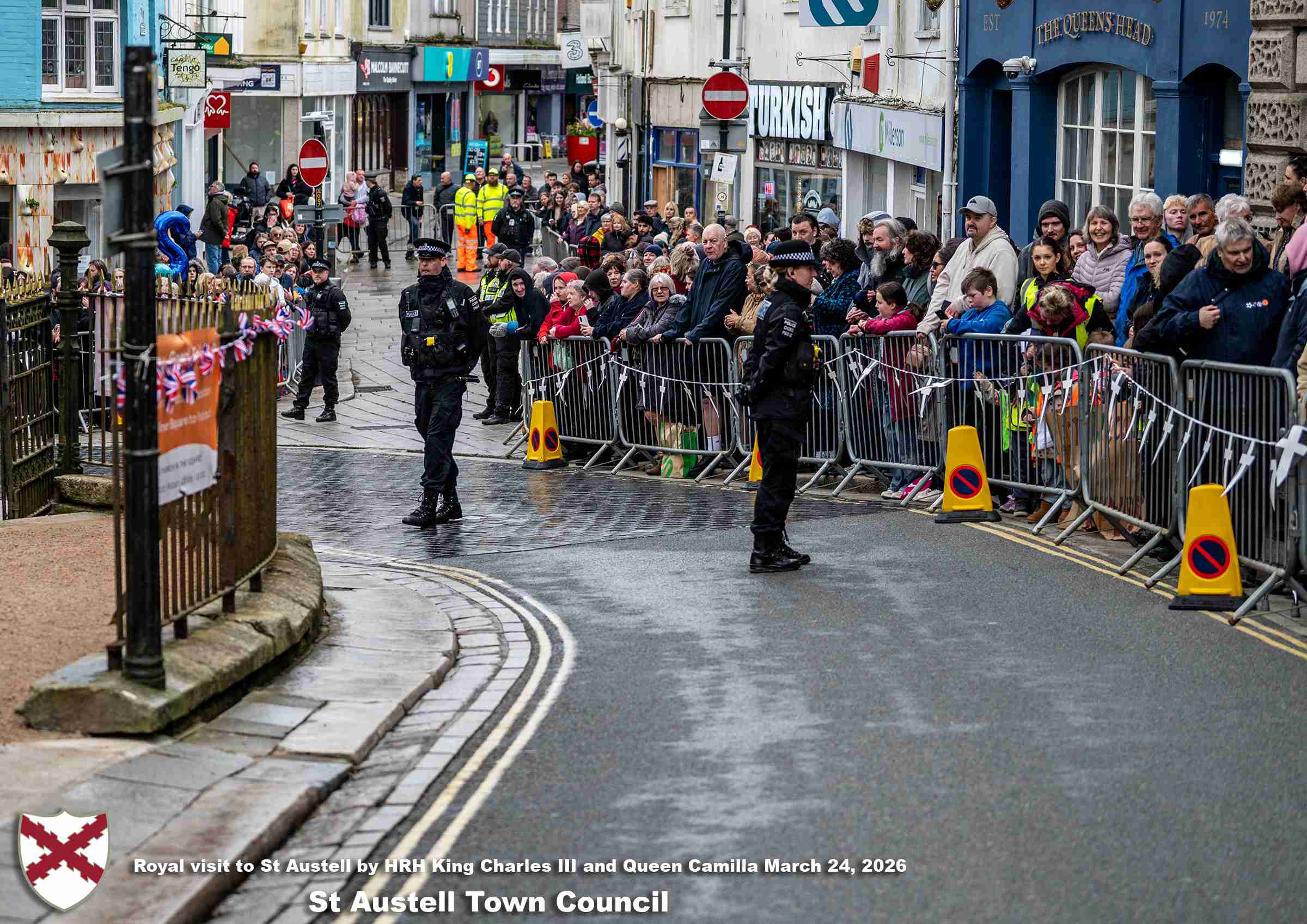 His Majesty King Charles and Her Majesty Queen Camilla meet members of the public in St Austell Town Centre.
