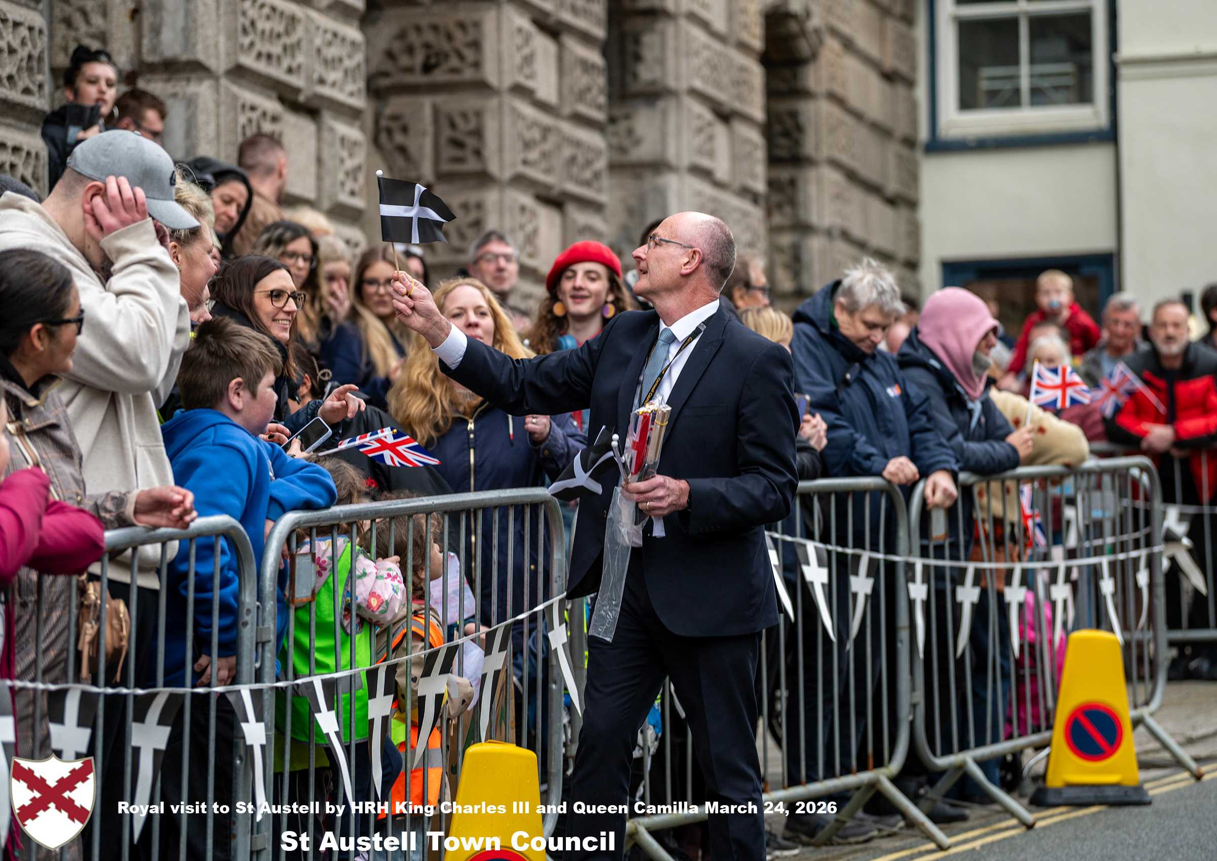 His Majesty King Charles and Her Majesty Queen Camilla meet members of the public in St Austell Town Centre.