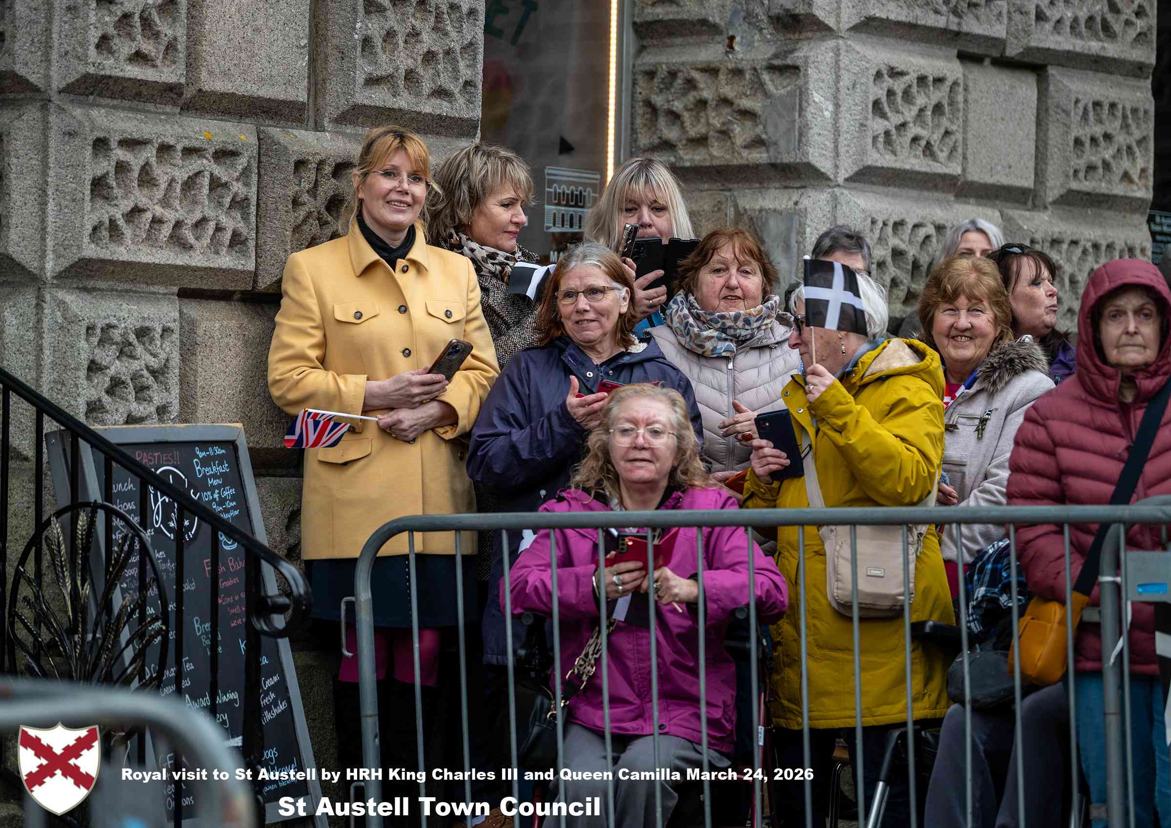 His Majesty King Charles and Her Majesty Queen Camilla meet members of the public in St Austell Town Centre.