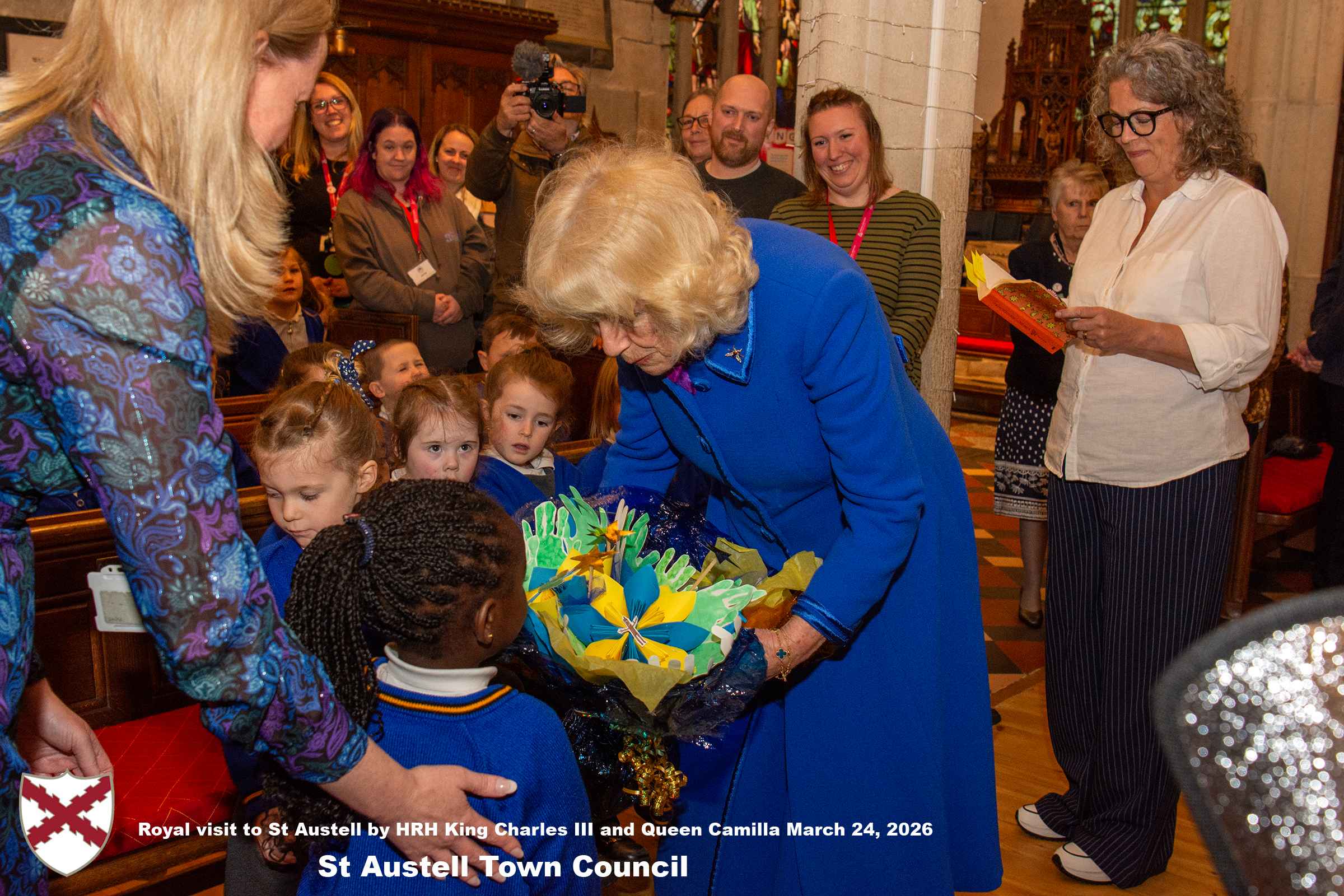Her Majesty Queen Camilla meets local organisations, volunteers and pupil’s from a local school at Holy Trinity Church.