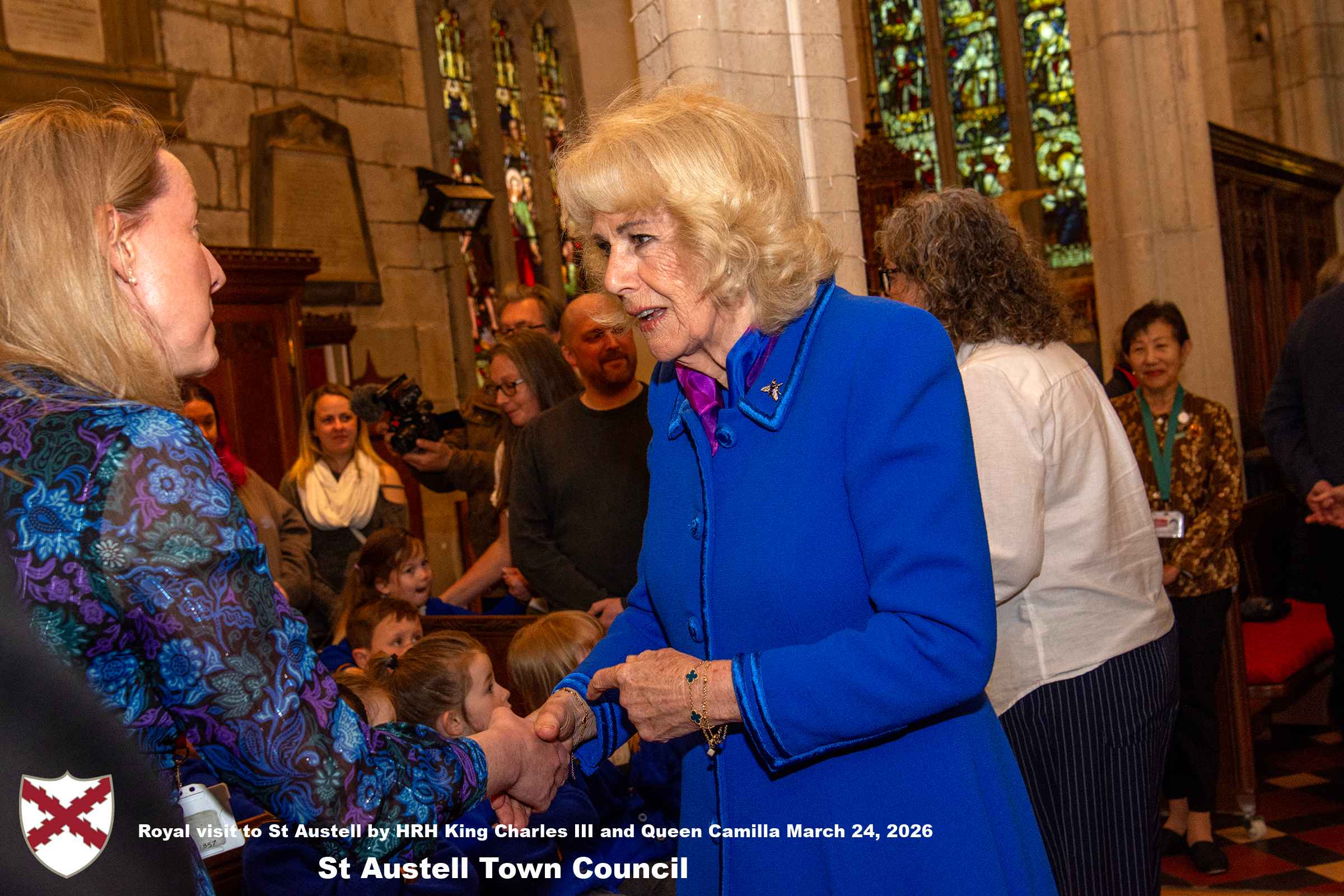 Her Majesty Queen Camilla meets local organisations, volunteers and pupil’s from a local school at Holy Trinity Church.