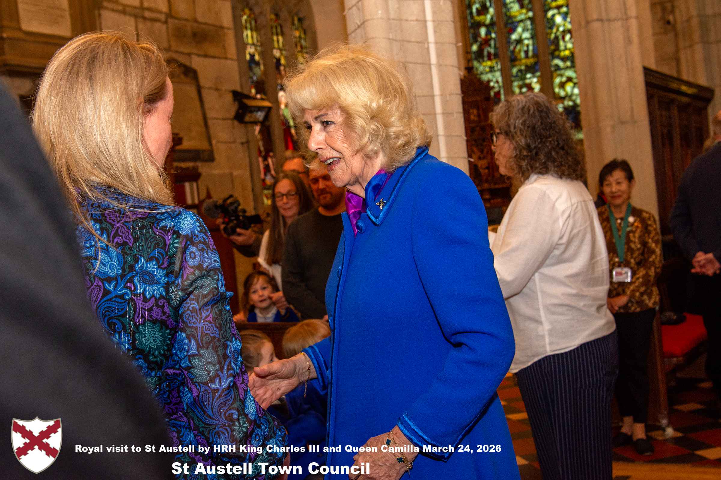 Her Majesty Queen Camilla meets local organisations, volunteers and pupil’s from a local school at Holy Trinity Church.