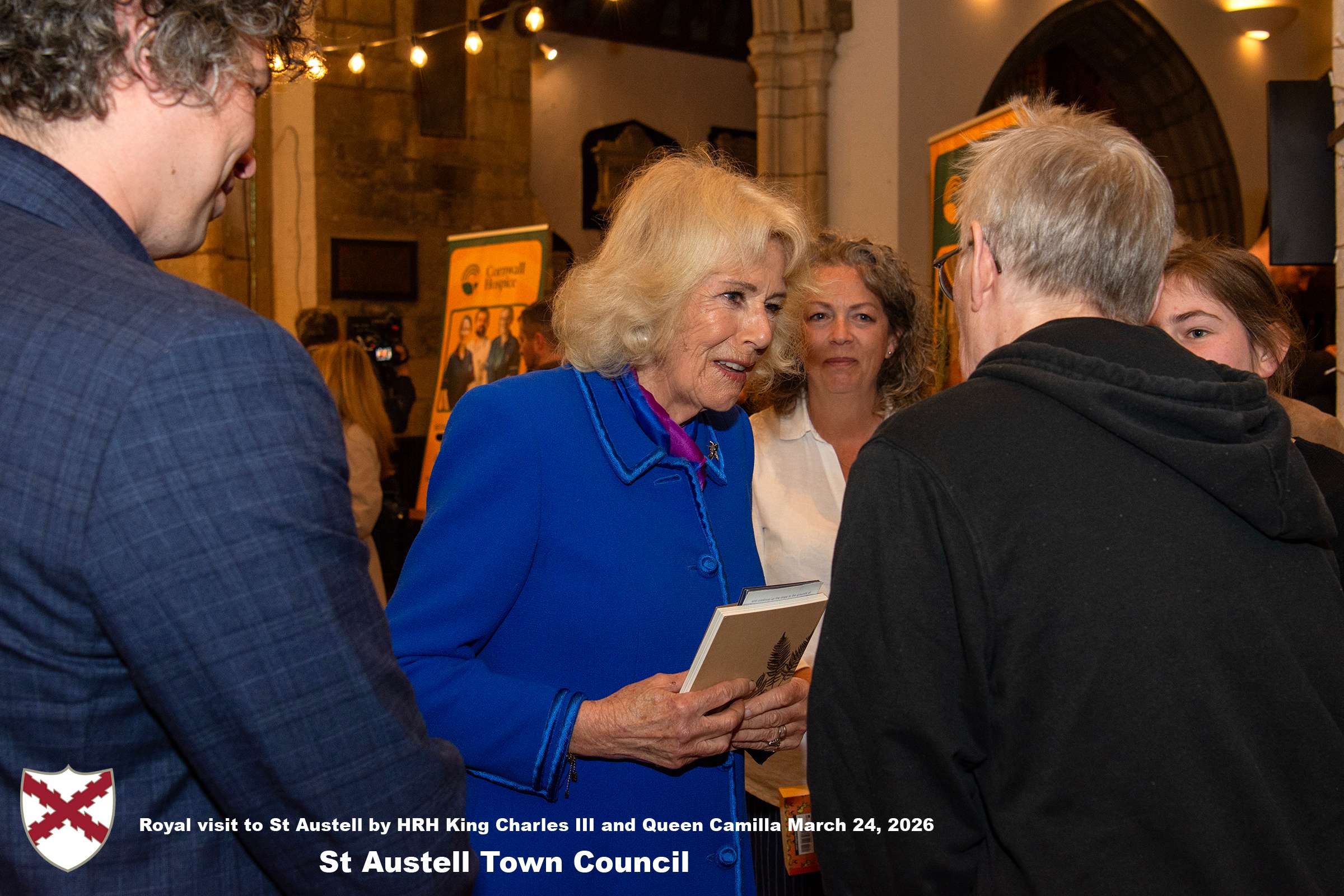 Her Majesty Queen Camilla meets local organisations, volunteers and pupil’s from a local school at Holy Trinity Church.