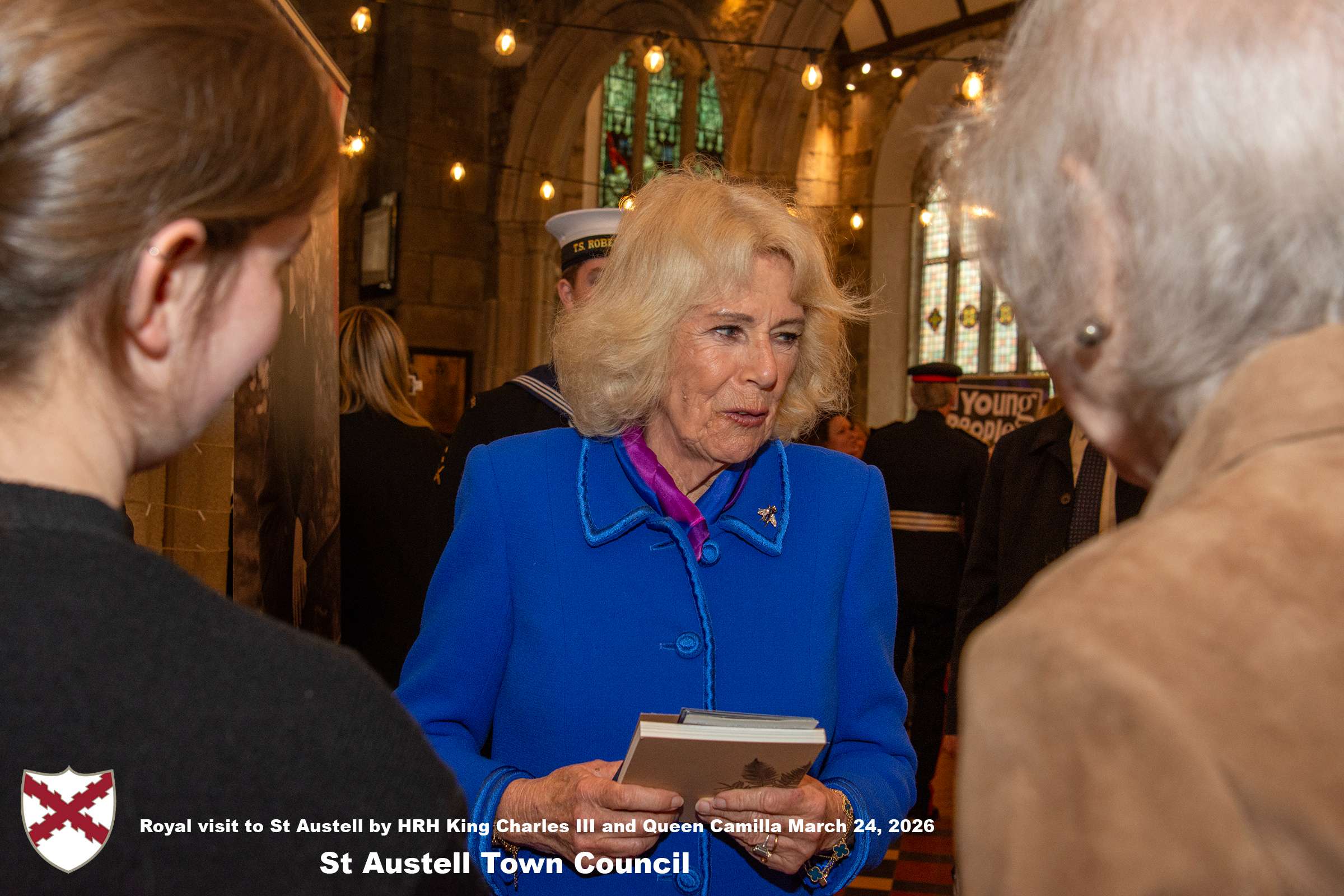 Her Majesty Queen Camilla meets local organisations, volunteers and pupils from a local school at Holy Trinity Church.