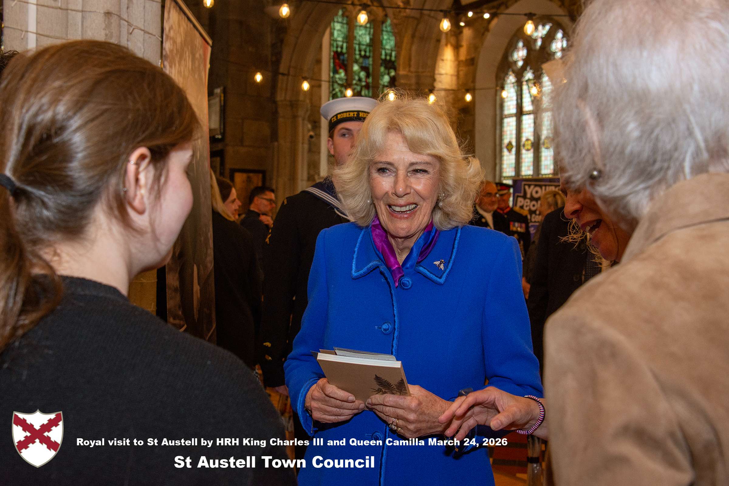 Her Majesty Queen Camilla meets local organisations, volunteers and pupils from a local school at Holy Trinity Church.