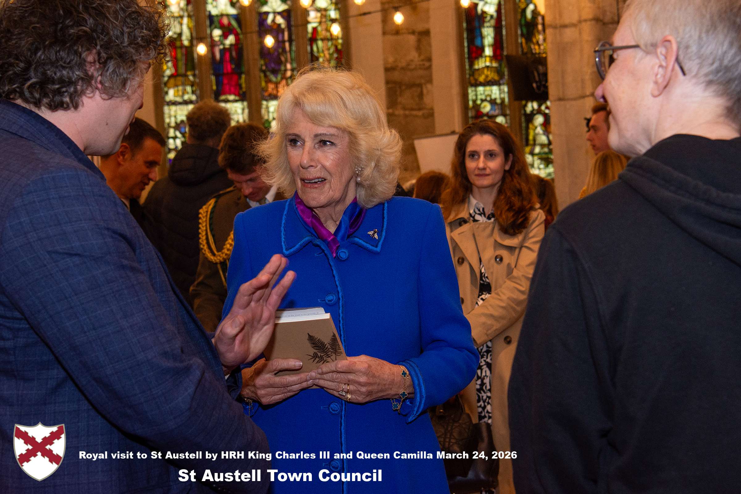 Her Majesty Queen Camilla meets local organisations, volunteers and pupils from a local school at Holy Trinity Church.