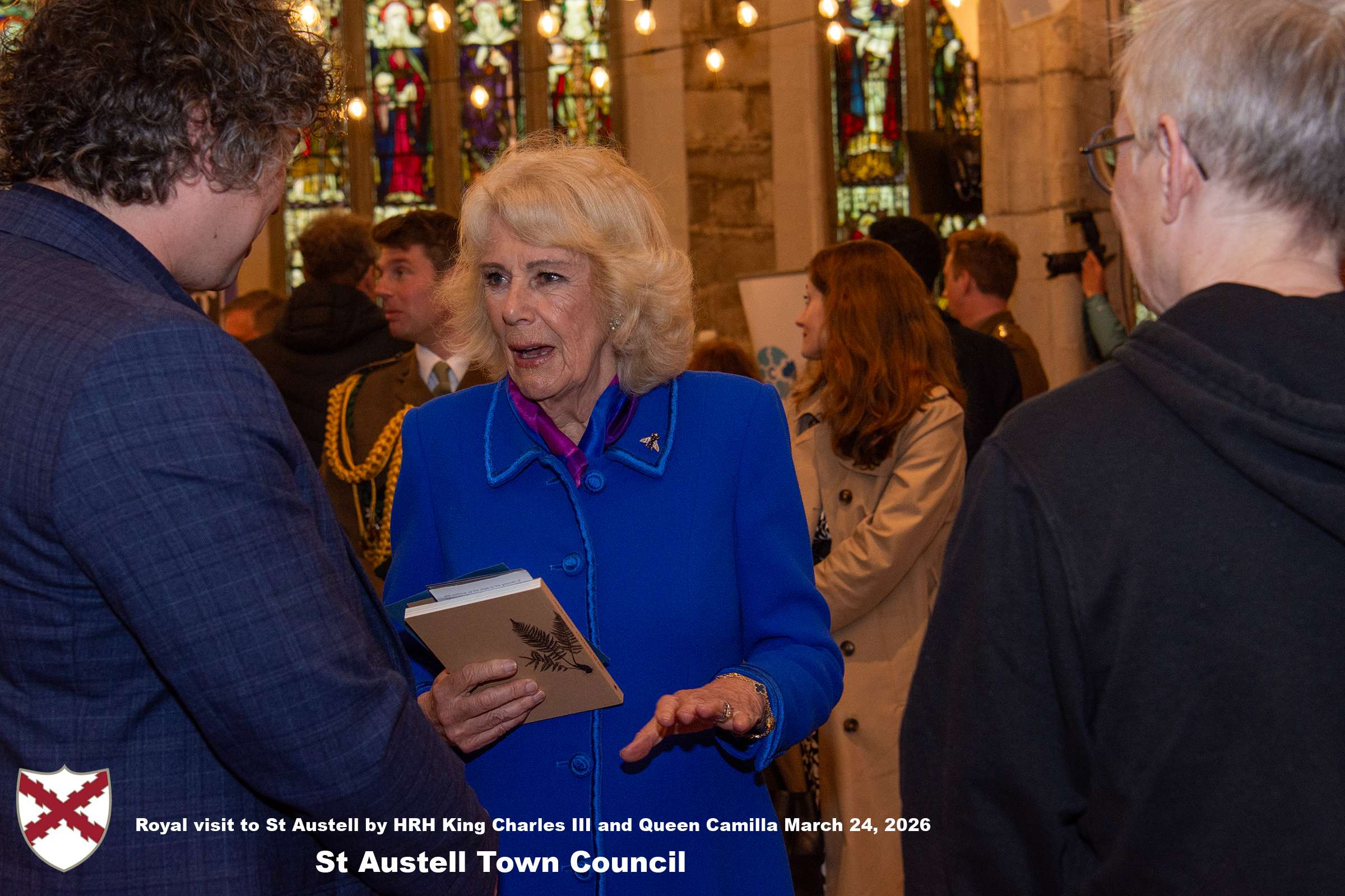 Her Majesty Queen Camilla meets local organisations, volunteers and pupils from a local school at Holy Trinity Church.