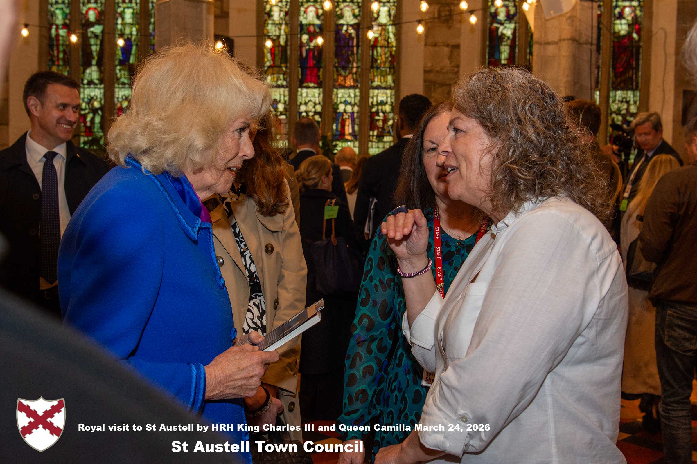Her Majesty Queen Camilla meets local organisations, volunteers and pupils from a local school at Holy Trinity Church.