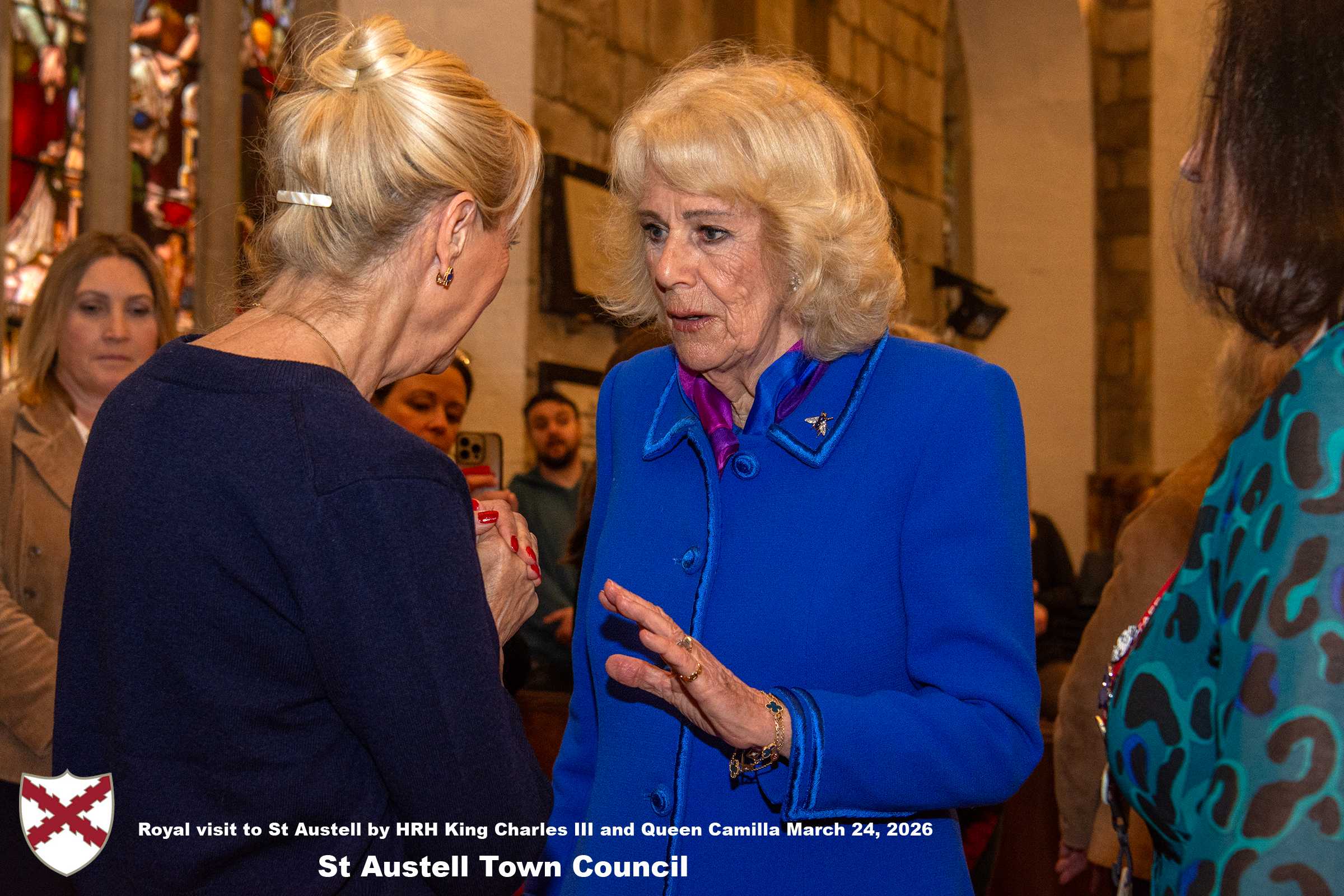 Her Majesty Queen Camilla meets local organisations, volunteers and pupils from a local school at Holy Trinity Church.