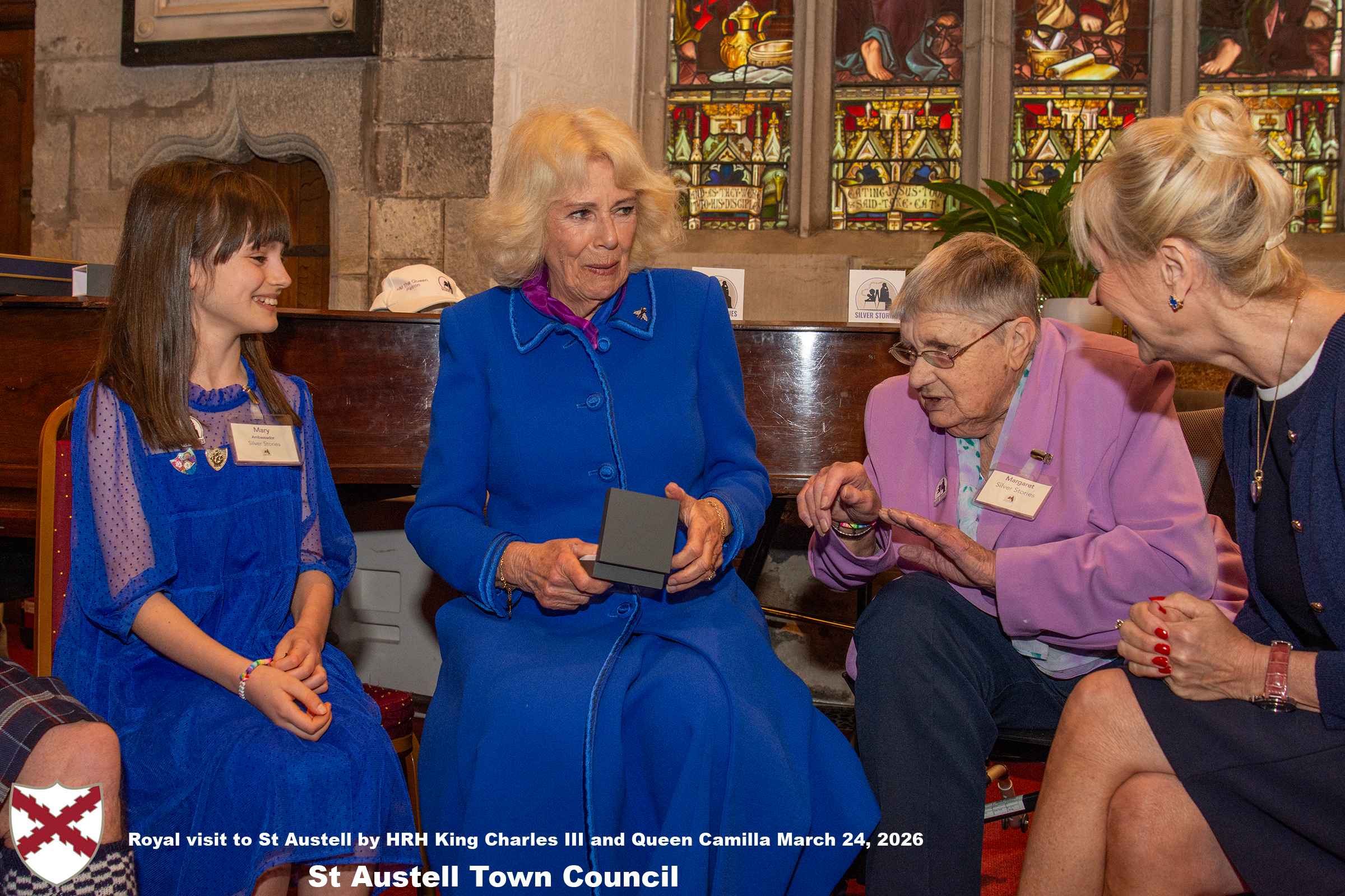Her Majesty Queen Camilla meets local organisations, volunteers and pupils from a local school at Holy Trinity Church.