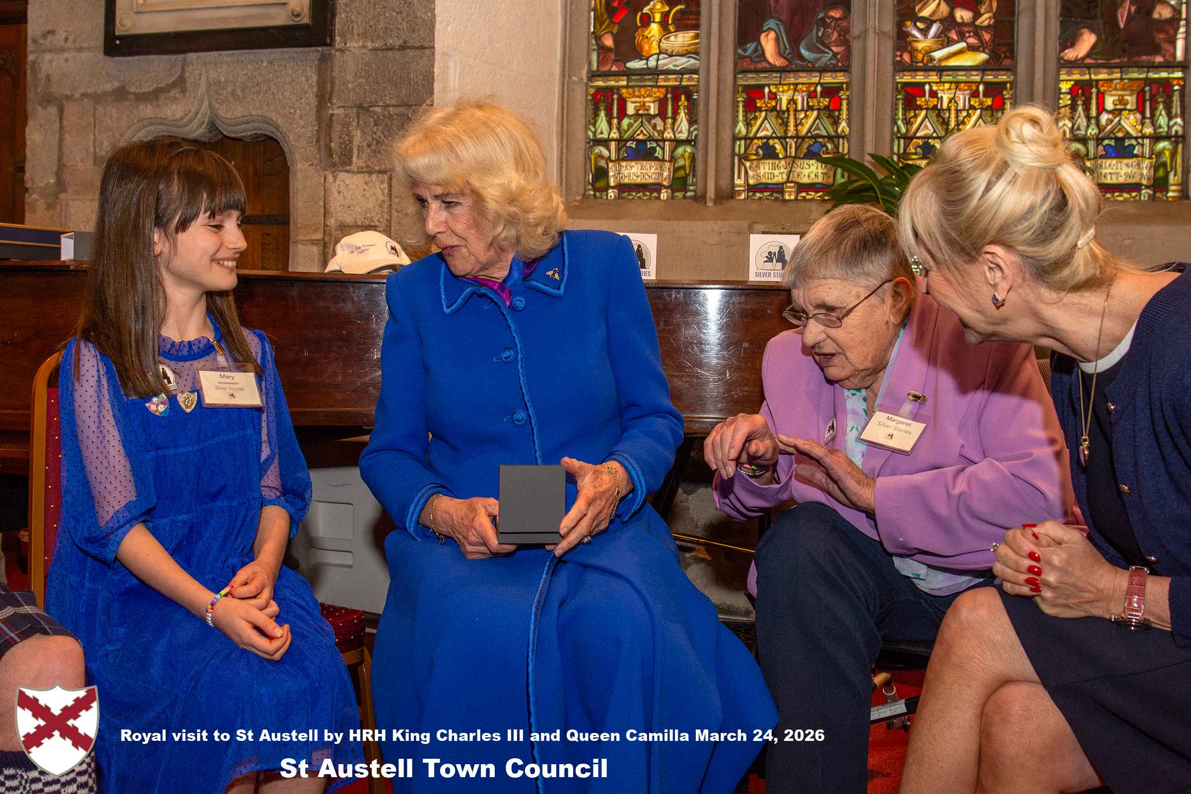Her Majesty Queen Camilla meets local organisations, volunteers and pupils from a local school at Holy Trinity Church.
