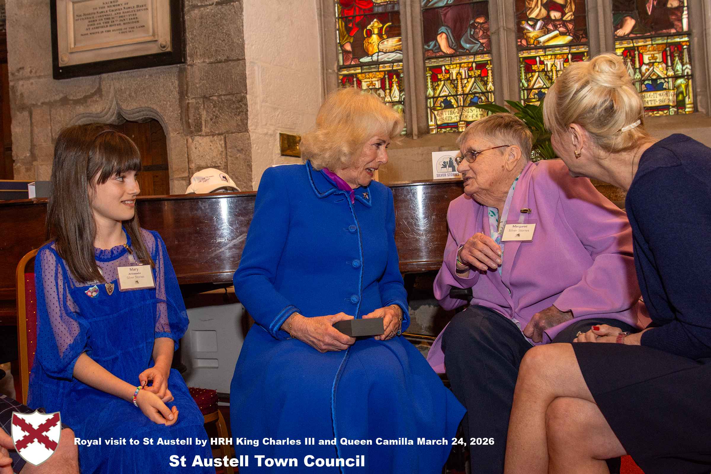 Her Majesty Queen Camilla meets local organisations, volunteers and pupils from a local school at Holy Trinity Church.