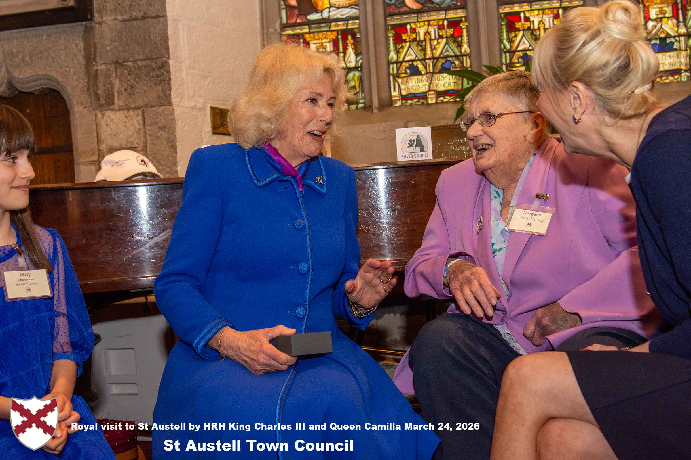 Her Majesty Queen Camilla meets local organisations, volunteers and pupils from a local school at Holy Trinity Church.