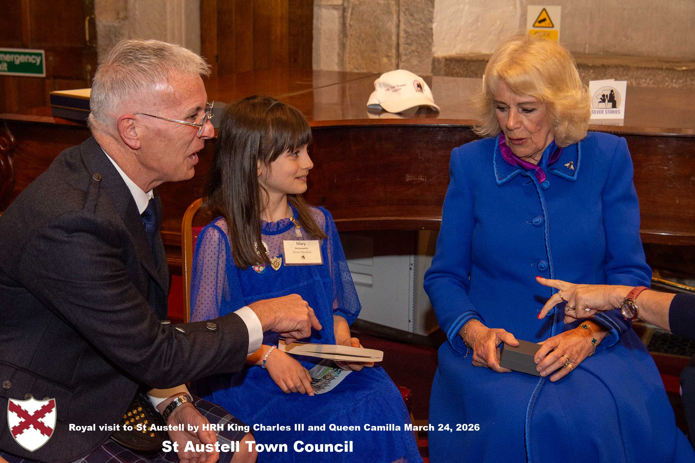 Her Majesty Queen Camilla meets local organisations, volunteers and pupils from a local school at Holy Trinity Church.