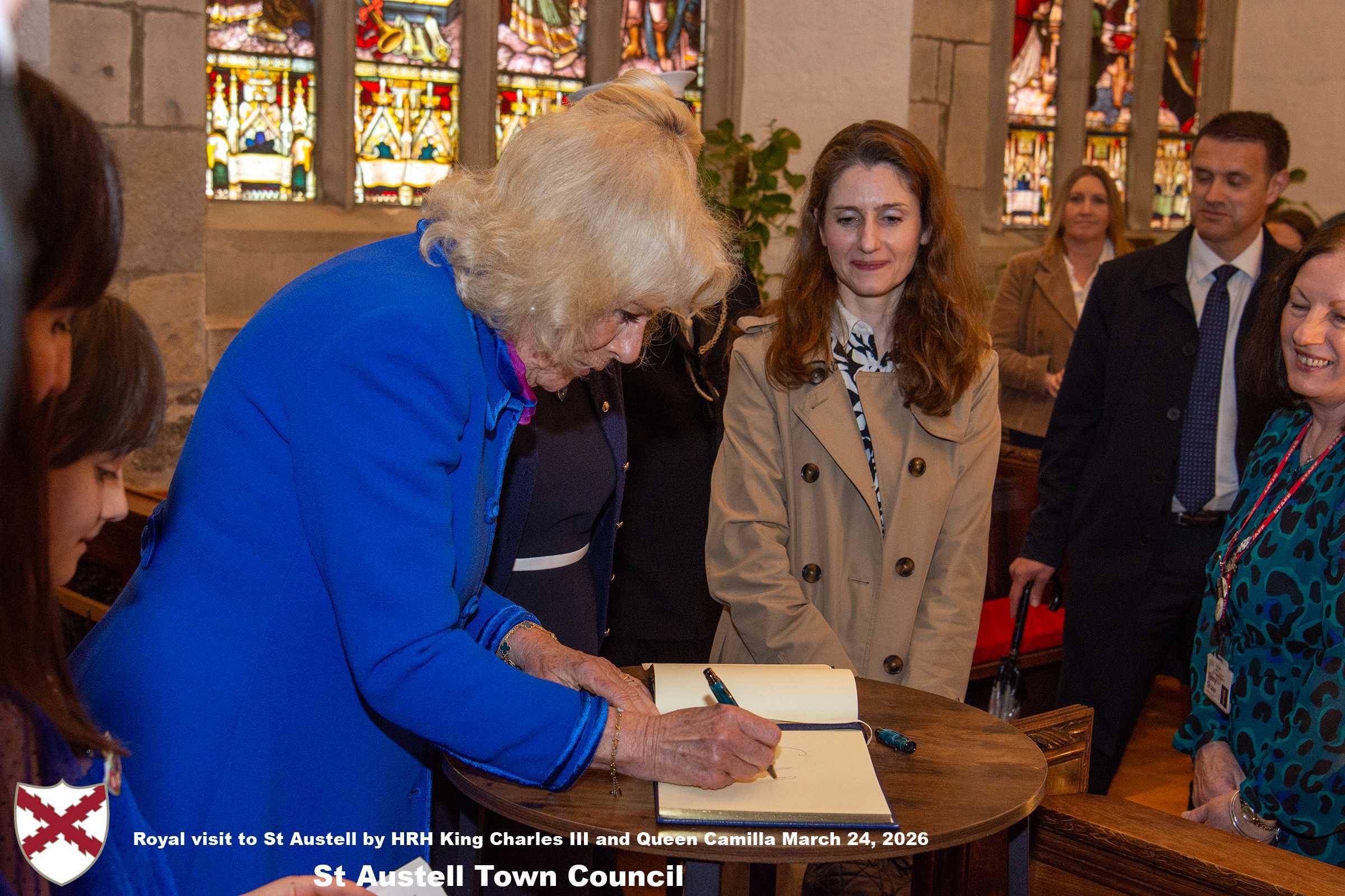 Her Majesty Queen Camilla meets local organisations, volunteers and pupils from a local school at Holy Trinity Church.