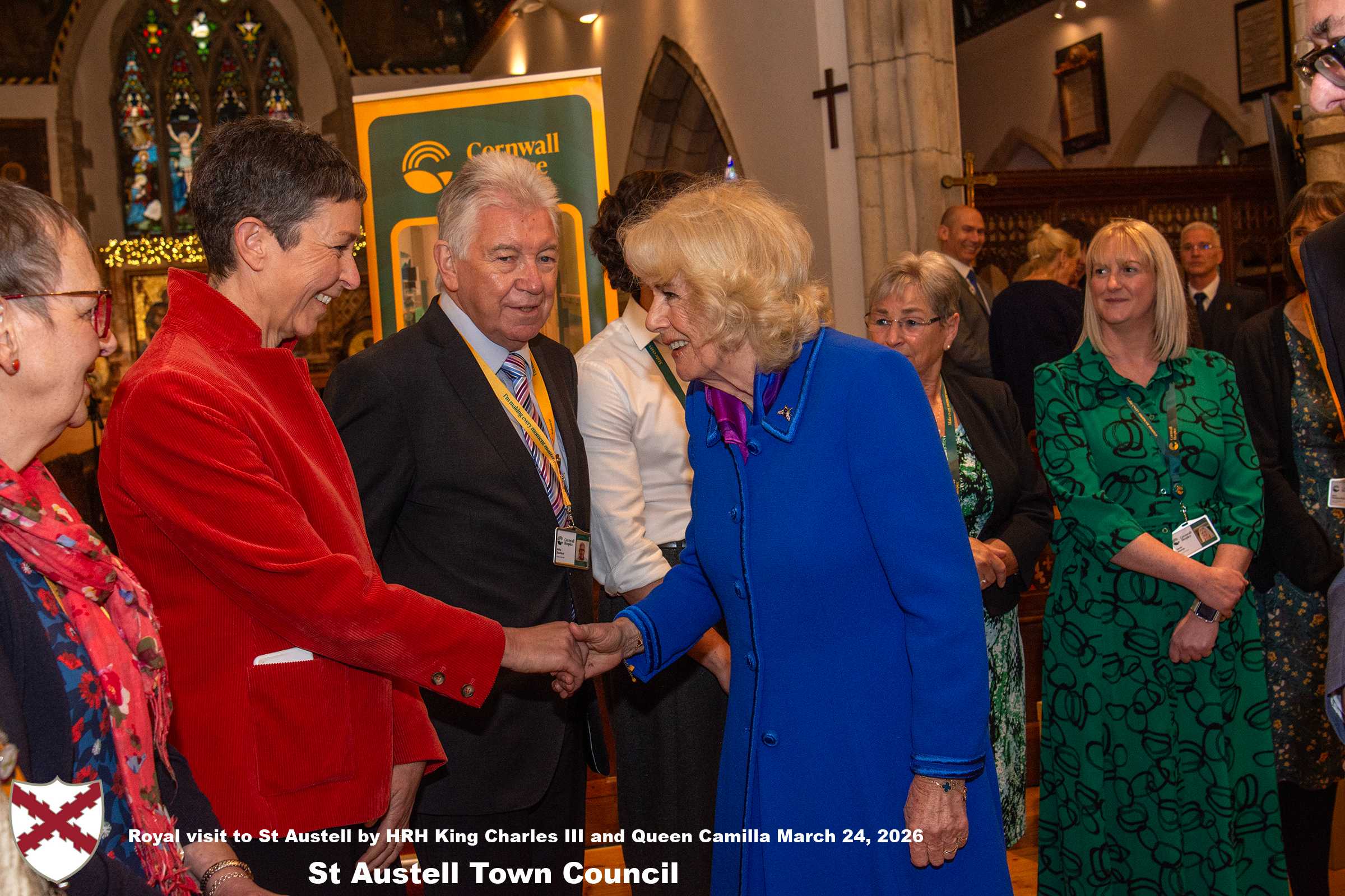 Her Majesty Queen Camilla meets local organisations, volunteers and pupils from a local school at Holy Trinity Church.