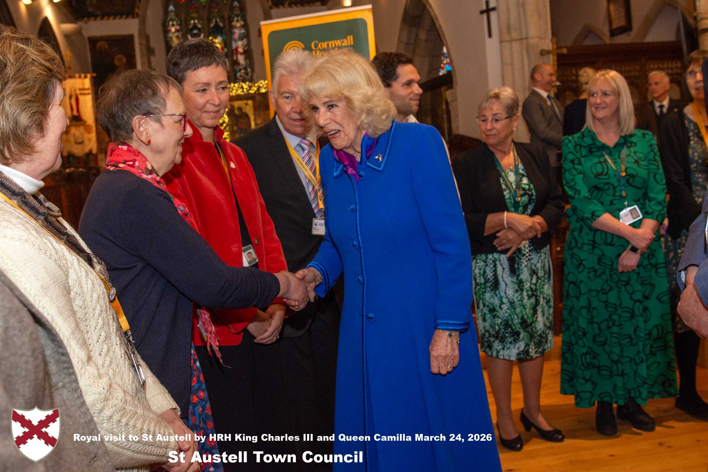 Her Majesty Queen Camilla meets local organisations, volunteers and pupils from a local school at Holy Trinity Church.
