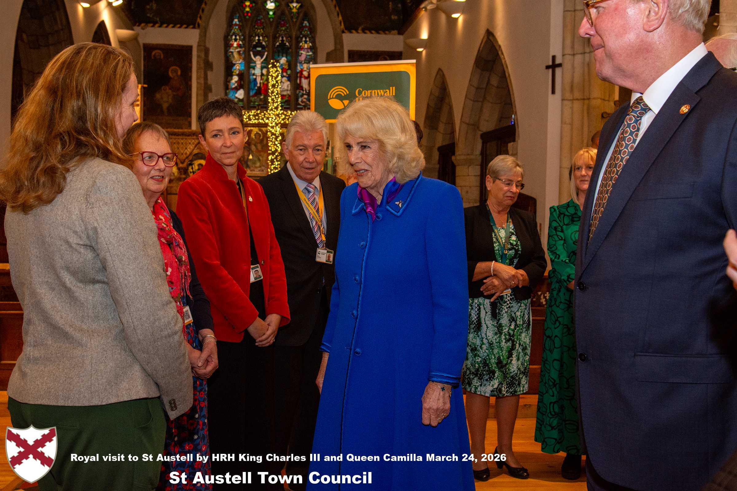 Her Majesty Queen Camilla meets local organisations, volunteers and pupils from a local school at Holy Trinity Church.