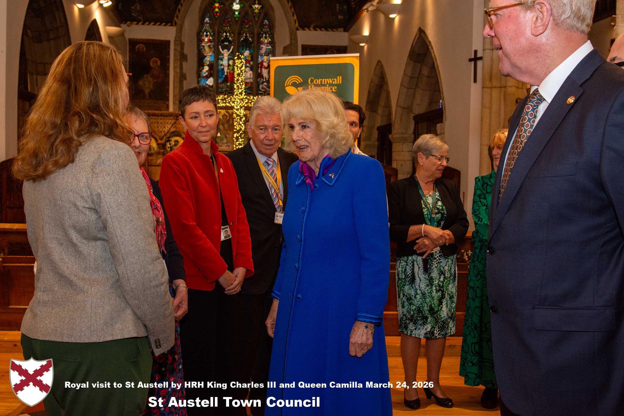Her Majesty Queen Camilla meets local organisations, volunteers and pupils from a local school at Holy Trinity Church.