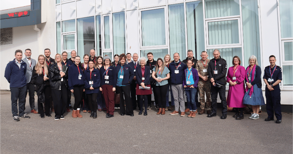 Professionals attending the event line up outside Poltair School