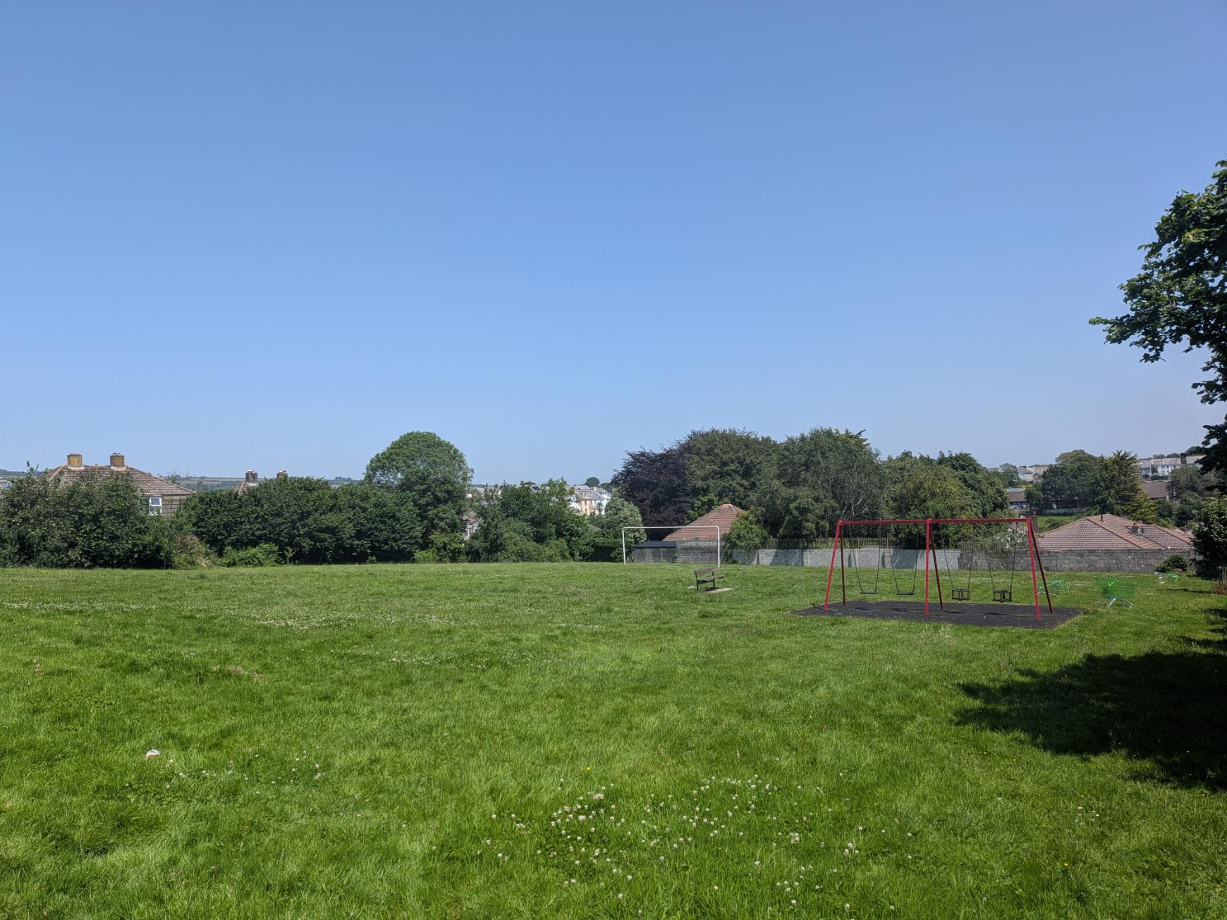 Swings and goal posts in Woodland Road Open Space, June 2026