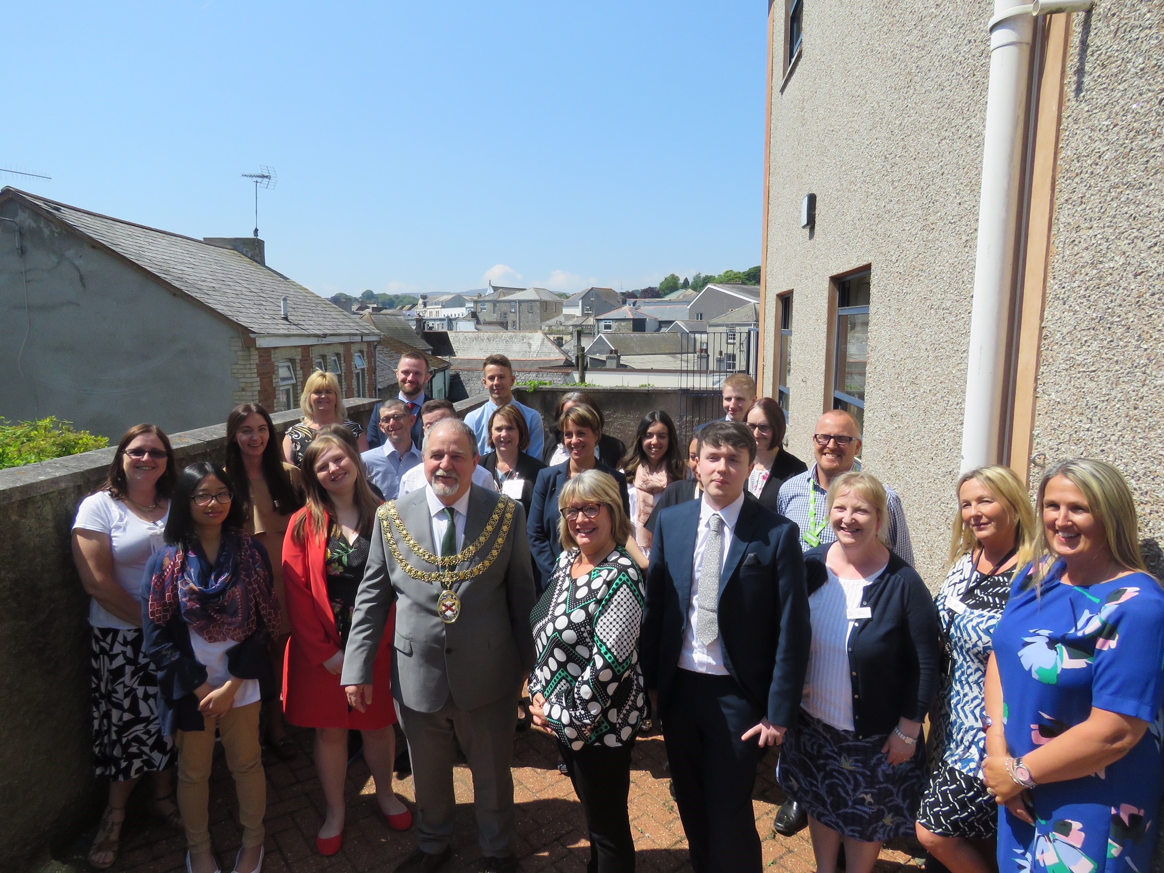Mayor Gary King poses with a local community group