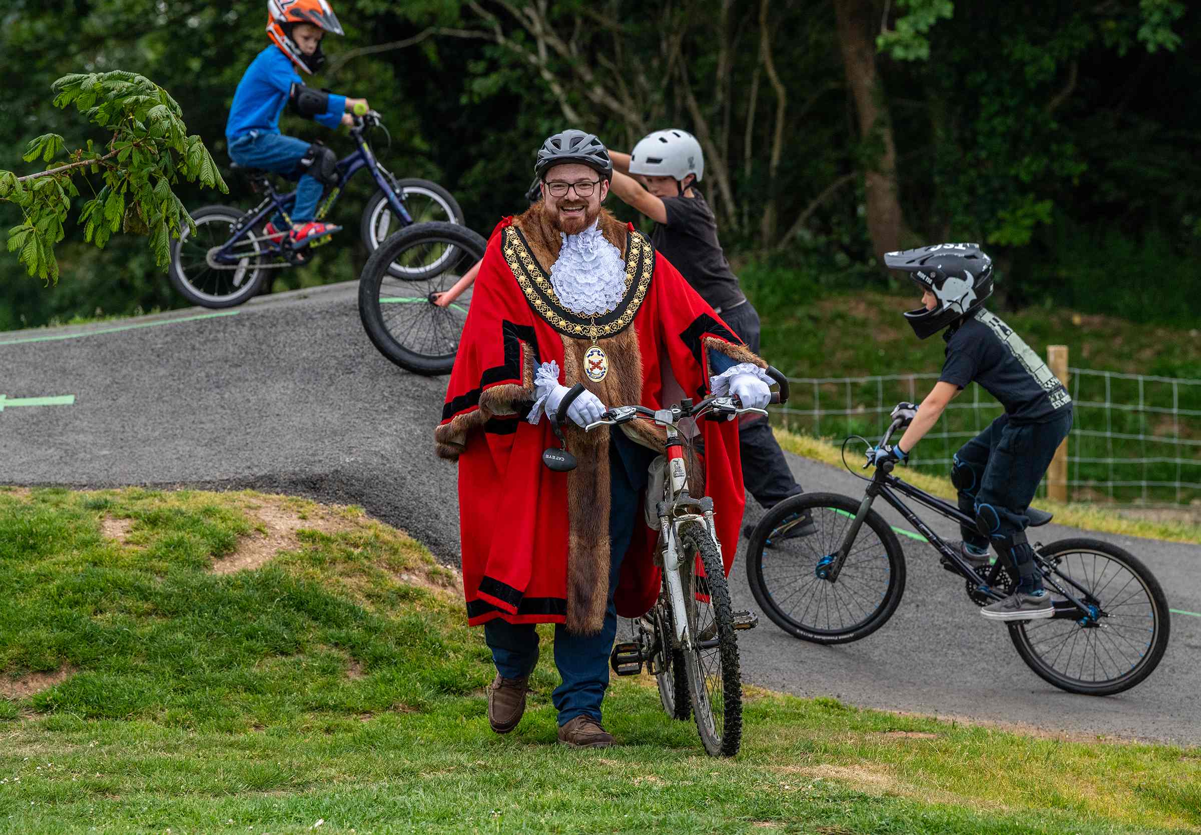 Cllr Ethan Stephens poses on a bike on the pump track
