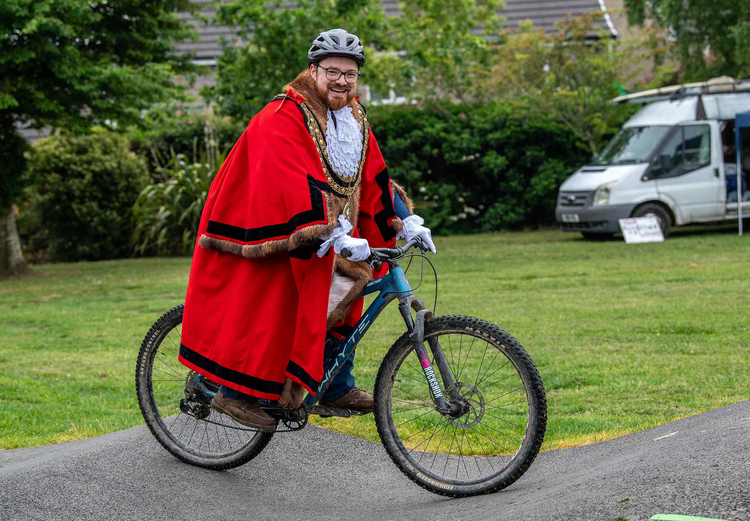 Cllr Ethan Stephens poses on a bike on the pump track